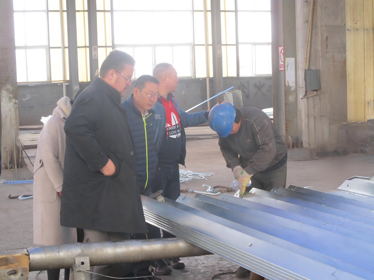 Client from Austria Visit Angle Steel Tower Production and Hot-dip Galvanization Line